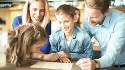 Family having lunch at a restaurant. Stock Footage