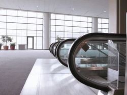  WS Two business associates talking and getting off escalator / Seattle, Washington, United States Stock Footage