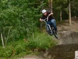 Rider on BMX stunt track Stock Footage