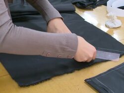 Drawing line at the fabric using by chalk Stock Footage