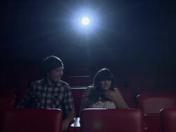 Young couple watching movie at the movie theater Stock Footage