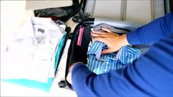 Packing Luggage for vacation Stock Footage