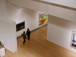 WS Visitors walking in art museum exhibiting modern paintings / Phoenix, Arizona, USA Stock Footage