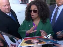 Oprah Winfrey at CBS News, signs for fans in New York City Stock Footage