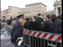 Exteriors, vox pops from crowd queuing to see Pope News Clip