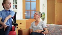 Disabled son with his mother Stock Footage