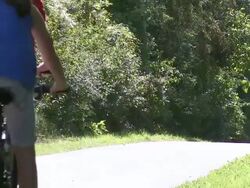 WS PAN Family with bicycle at mosel valley / Nittel, Rhineland-Palatinate, Germany                              Stock Footage