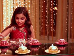 Girl burning candles in diwali festival Stock Footage