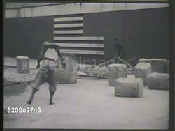 1940s: SINGAPORE: HARBOR: HA WS Busy dock, ships crowded in harbor BG. VS Cargo shipped dock at pier, workers moving shipments, crane moving cargo. VS Ships in dry dock, construction of dock. Port Instructional Video