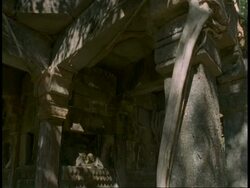 MS time lapse sun moving over Hindu statue, Bandhavgarh National Park, India Stock Footage