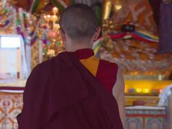 MS Boy in Buddhist monk robes swaying side to side in prayer  AUDIO / Kathmandu, Central Region, Nepal  Stock Footage