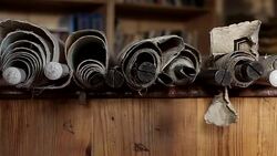 Old maps on wooden table Stock Footage