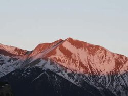 MS ZO T/L View of sunset over pyrenees with moon / Pyrenees, Spain Stock Footage