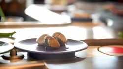 HD : Dishes of food on conveyor belt Stock Footage