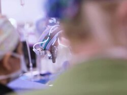 Doctors performing a surgery Stock Footage