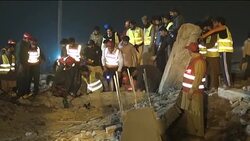 CLEAN : 16 dead 100 trapped after Pakistan factory collapse News Clip