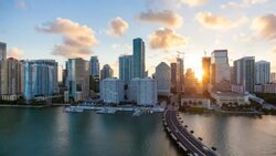 View from Brickell Key, a small island covered in apartment towers, towards the Miami skyline, Miami, Florida, USA - Time lapse Stock Footage