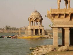 Architectural structure in the lake, Gadisar Lake, Jaisalmer, Rajasthan, India Stock Footage