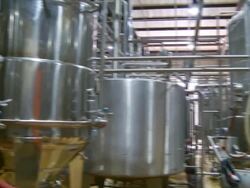 MS PAN Shot of boiling tanks in brewery / Wau, Western Bahr el Ghazal, Sudan  Stock Footage