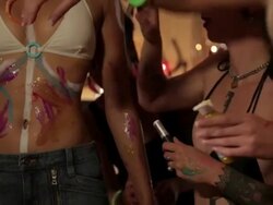 Group of women painting friend Stock Footage