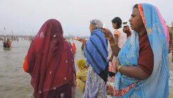 Kumbh Mela Hindu festival 2013, Naga baba gurus and pilgrims bathing in Ganges River. Stock Footage