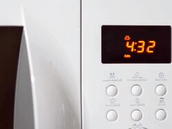 countdown program on microwave Stock Footage
