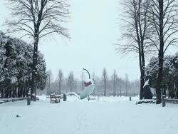 WS Cherry In spoon sculpture during winter with snow on it / Minneapolis, Minnesota, United States Stock Footage