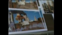 Pavement seller selling 9/11 posters News Clip