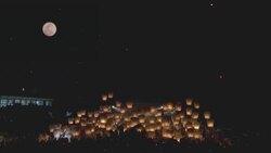 Paper lanterns float into the night sky during a festival in Taipei, Taiwan. Stock Footage