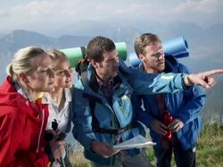 Group of backpacker looking on map Stock Footage