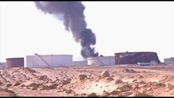Storage tank hit as armed groups fight for control of biggest oil export terminal News Clip