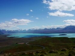 View of Lake and snowcapped mountains Stock Footage