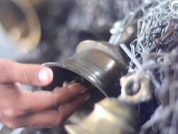 Indian lady is ringing bell Stock Footage