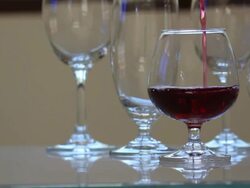 Pouring red wine. Stock Footage
