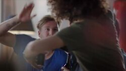 Guys sitting on couch watching tv and cheering Stock Footage