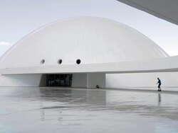 Niemeyer Centre Spain visitors roller bladeing Stock Footage