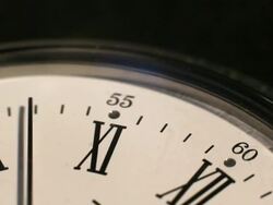 Clock mark the hours. Time passes inexorably Stock Footage
