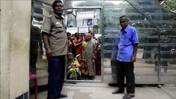 CLEAN : Bangladeshi Buddhist monks feed fasting Muslims over Ramadan News Clip