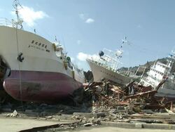 Destruction in Kesennuma City, a traditional fishing town in N E Japan filmed on 1 April 2011, 3 weeks after a tsunami which was caused by magnitude 9 Tohoku earthquake off north east Japan / AUDIO Stock Footage