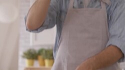 Chef cutting tomato in the kitchen Stock Footage