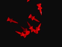 MS SLO MO Shot of Red Tees Falling against Black background / Vieux Pont en Auge, Normandy, France Stock Footage