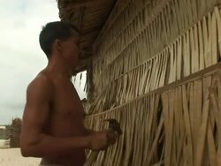 MS Man and woman building house with babacu straw / Ilha dos Lencois, Maranhao, Brazil Stock Footage