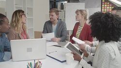 Young Businesspeople Brainstorming In Their Office. Stock Footage