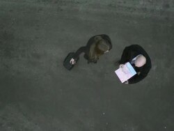 HD CRANE: Two Business People Got Lost In The City Stock Footage