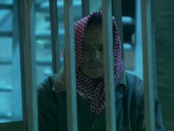 CU Shot of man waiting and praying at Israelian-palestinian frontier around fire camp / Israel Palestine, Israel Stock Footage