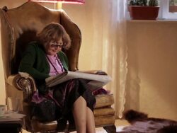 MS TU Senior woman playing crossword puzzle in newspaper  / Berlin, Germany Stock Footage