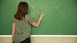 Young student writing math formula Stock Footage