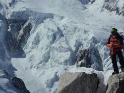 ZI  Mountaineer using GPS  in high mountains/French Alps Stock Footage
