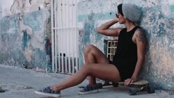 Urban skate girl with smart phone in street Stock Footage