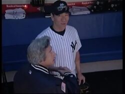 Japanese PM throws first pitch in baseball game News Clip